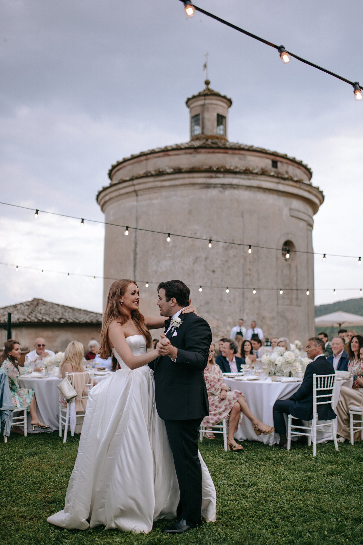 Bride and groom first dance at Castello di Celsa wedding venue Tuscany