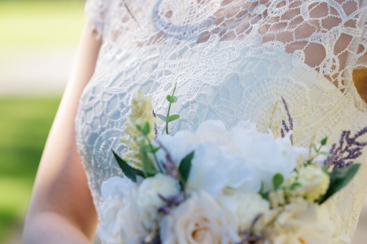 bridal details bouquet and lace dress