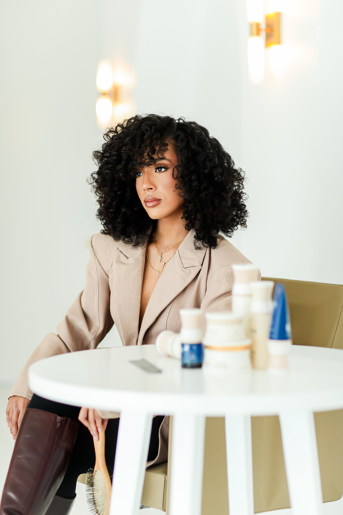 Model sitting in chair
