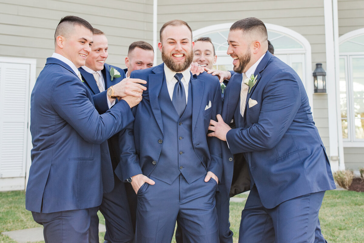 groomsmen laughing chesapeake bay beach club