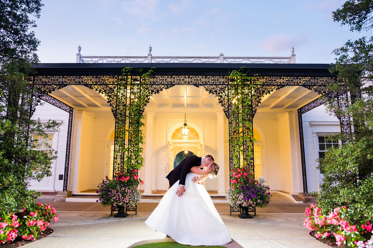 night wedding photo in front of the fox chapel golf club