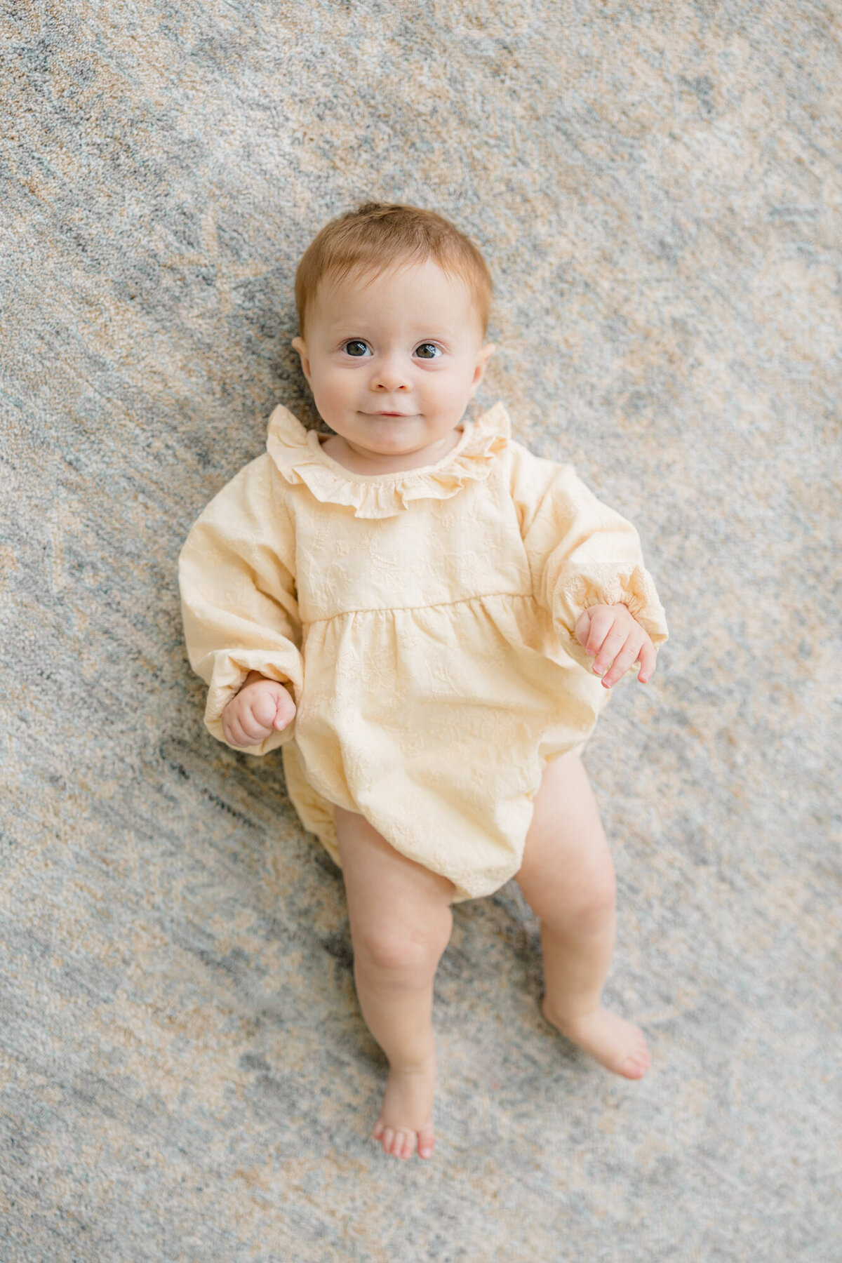 6 month old laying down