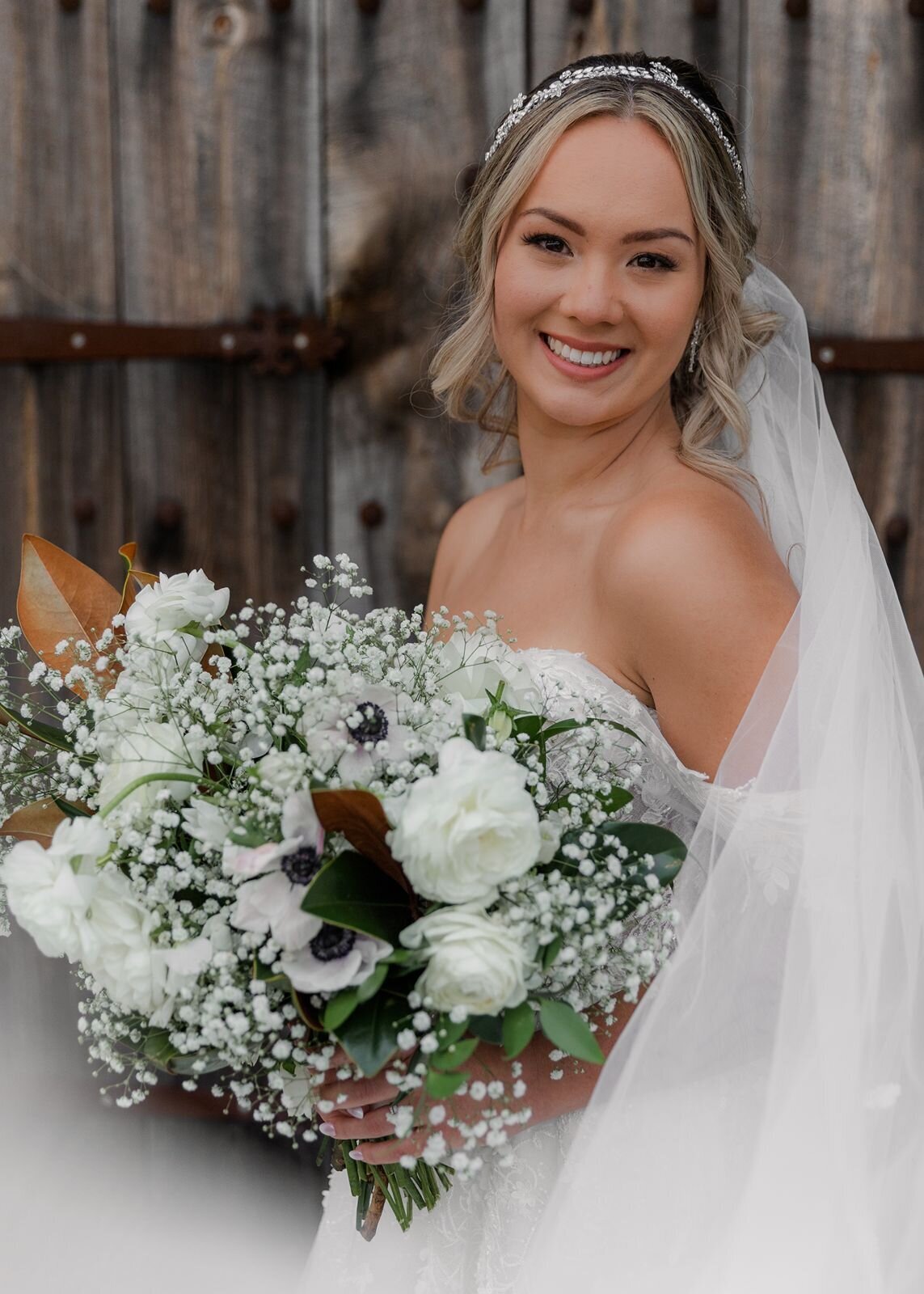 Bride with florals at Bella Cosa, Lake Wales, Florida