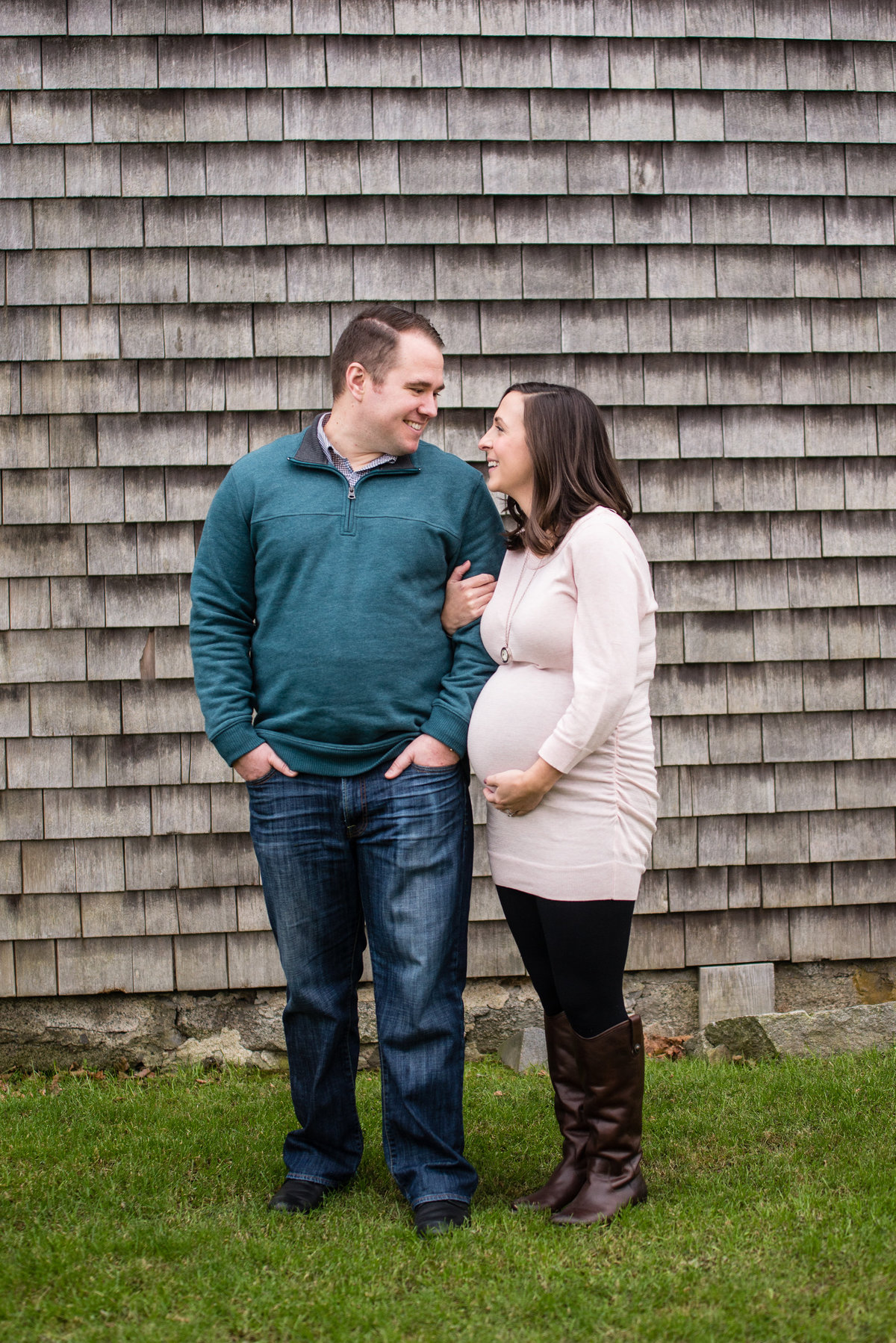 Couple looking at each other maternity session