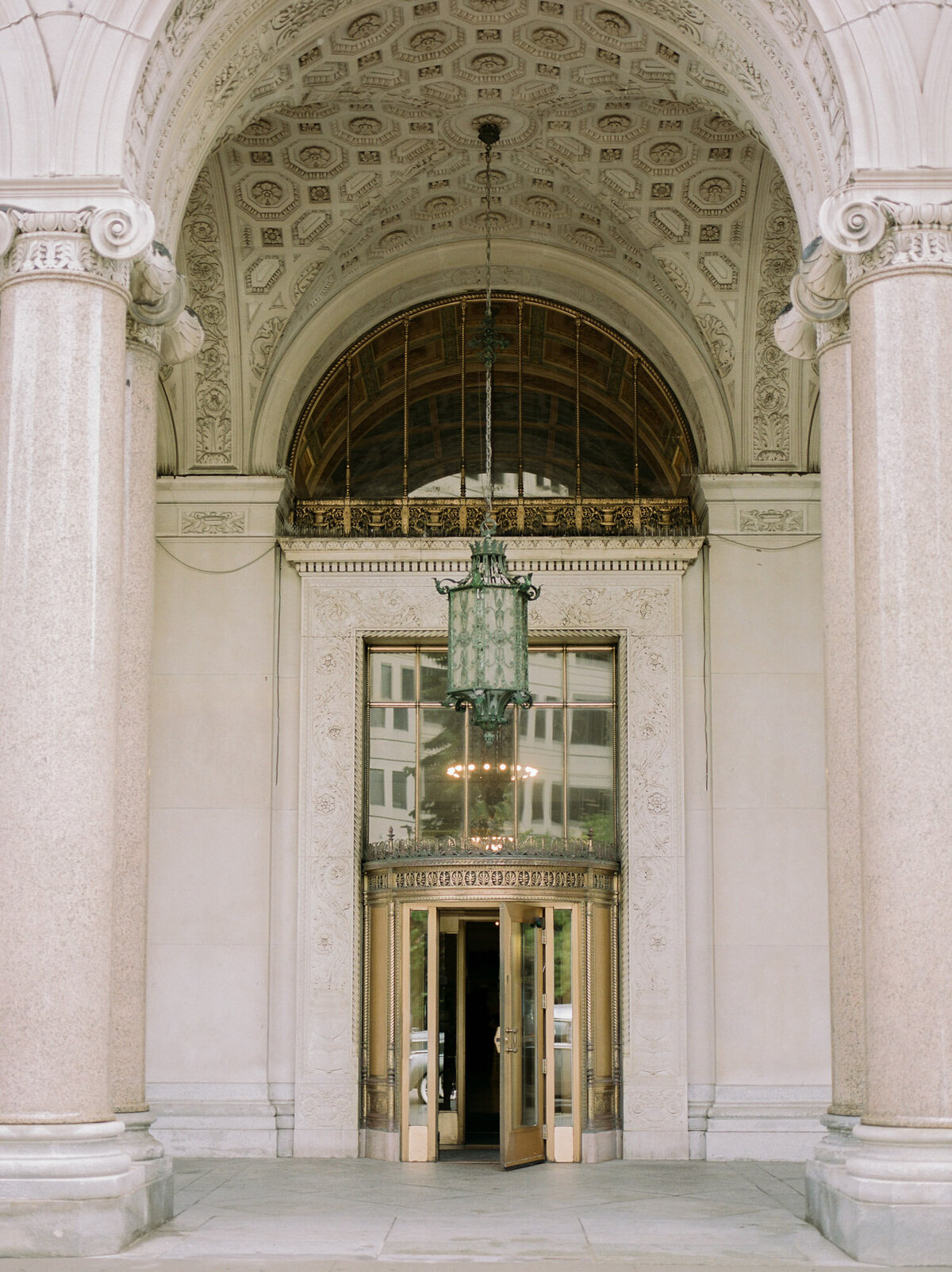 stunning ornate historic architecture in Detroit with gilded doors, art deco, unique Detroit wedding venue