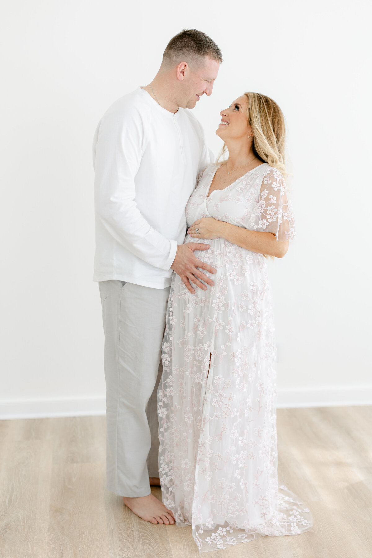 pregnant parents in studio by Philadelphia Maternity Photographer