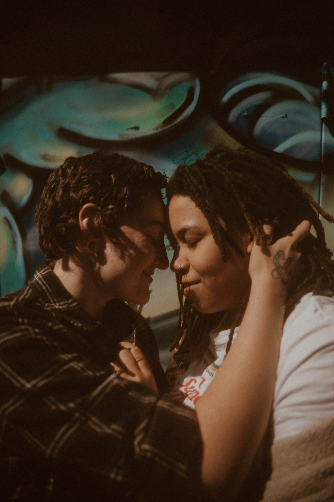 lgbtq couples portrait with heads together 