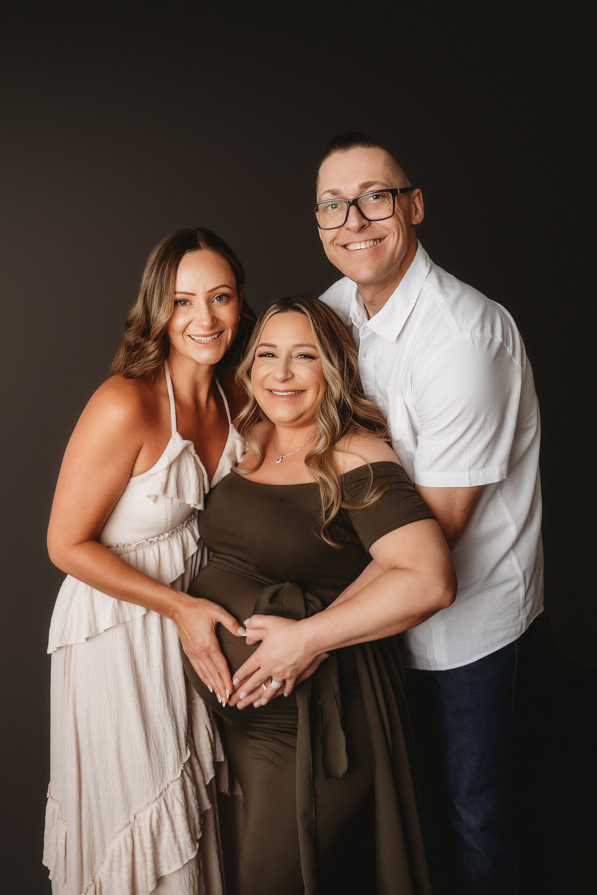 Pregnant mother poses for Maternity Portraits in Charleston, SC. 