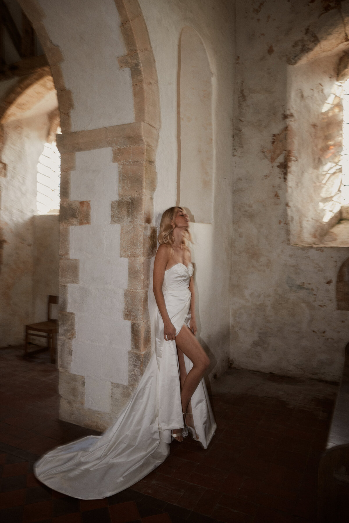 Benjamin Wheeler photography of bride wearing handmade silk wrap wedding dress