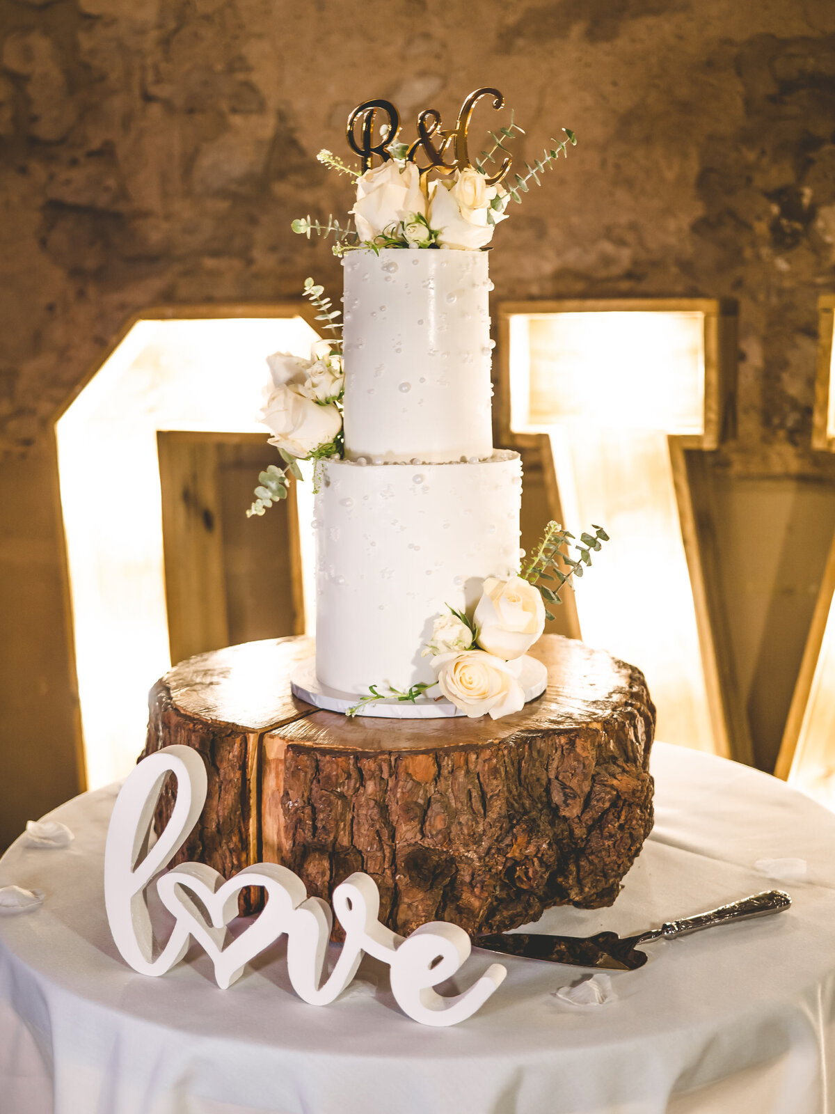 Pearl wedding cake with white flowers
