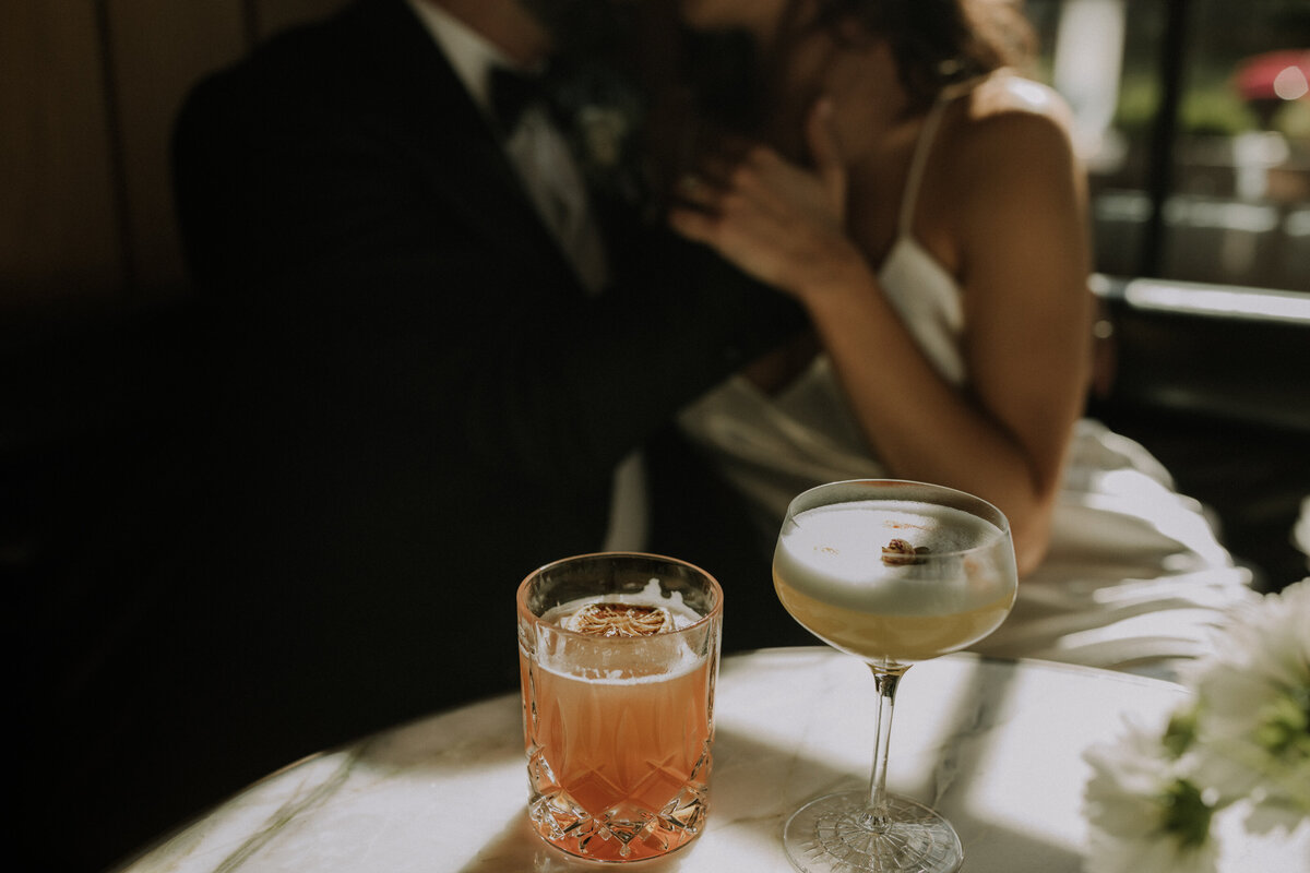 drinks in front of bride and groom
