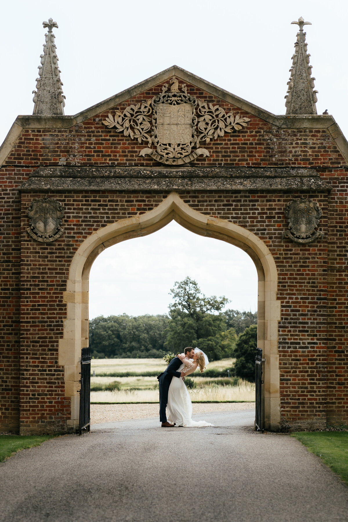 Bride-Groom-Kissing-Madingley-Hall