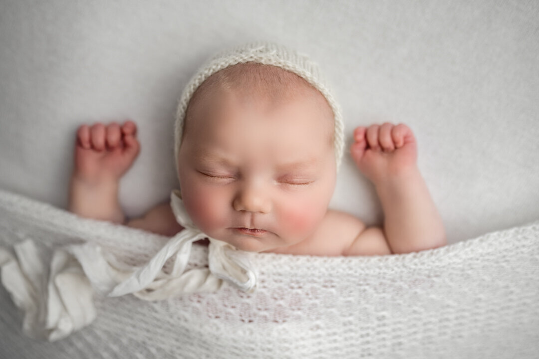Grand Rapids Newborn Photography Baby Wrapped with Arms Up by For the Love of Photography
