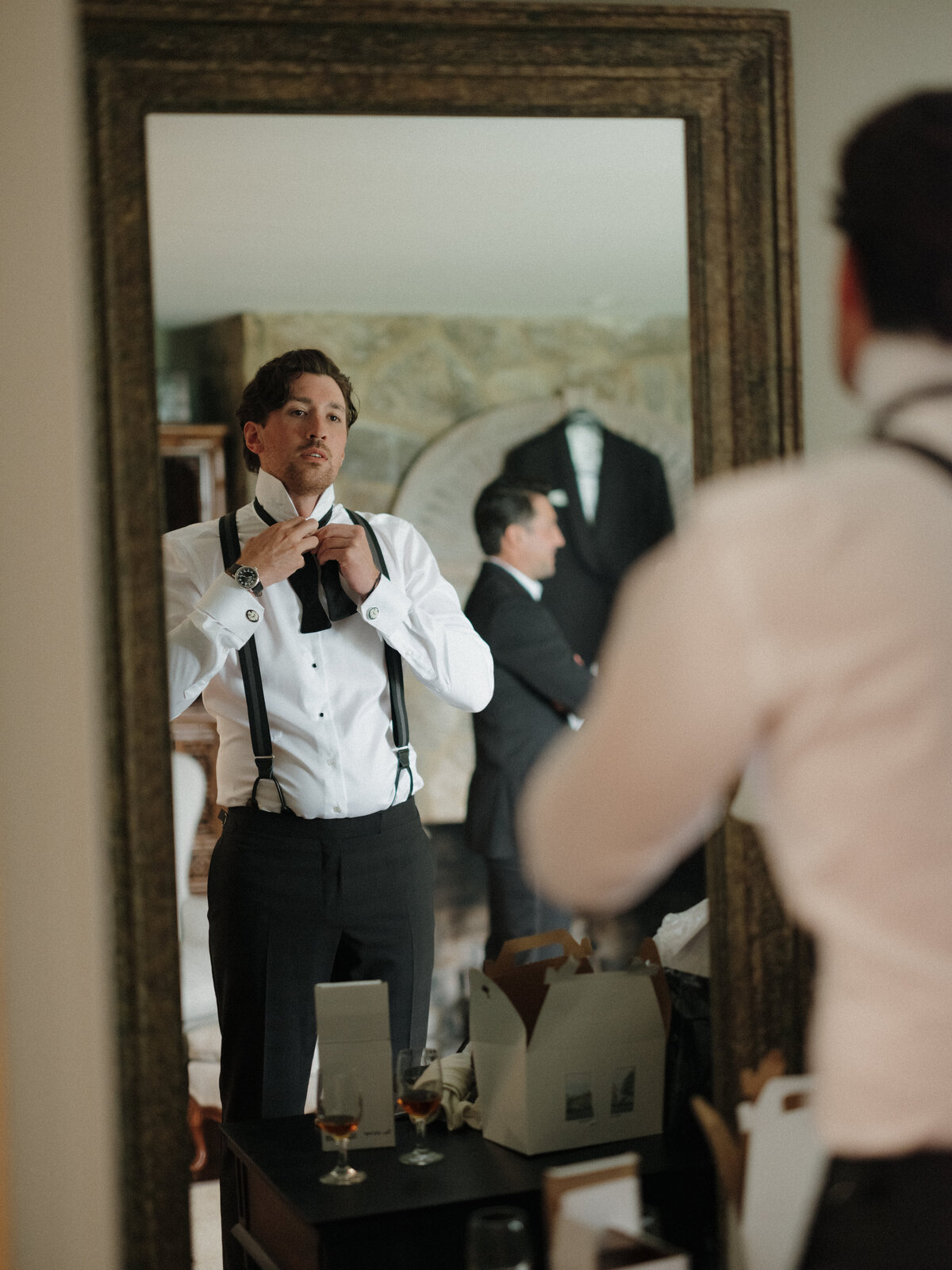 Sophisticated film photography demonstrating editorial wedding photography at Connecticut's most elegant destination venue. Lauren Alatriste's fashion photography background elevates traditional wedding documentation, creating luxury imagery that balances artistic vision with emotional authenticity.