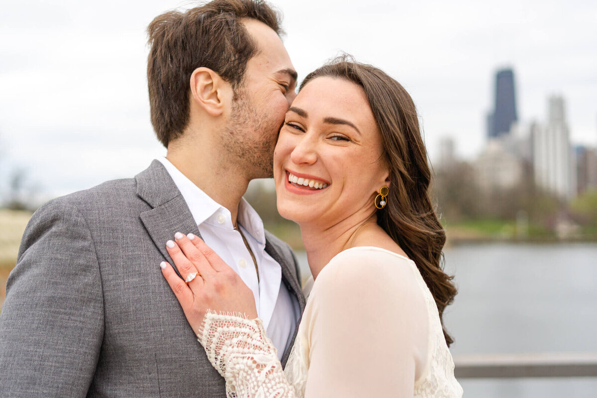 Modern Jewish Wedding in Chicago photo of couple smiling with wedding rings