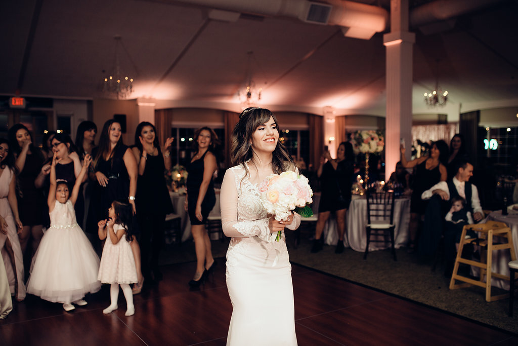 Wedding Photograph Of Bride Preparing To Throw The Wedding Bouquet Los Angeles