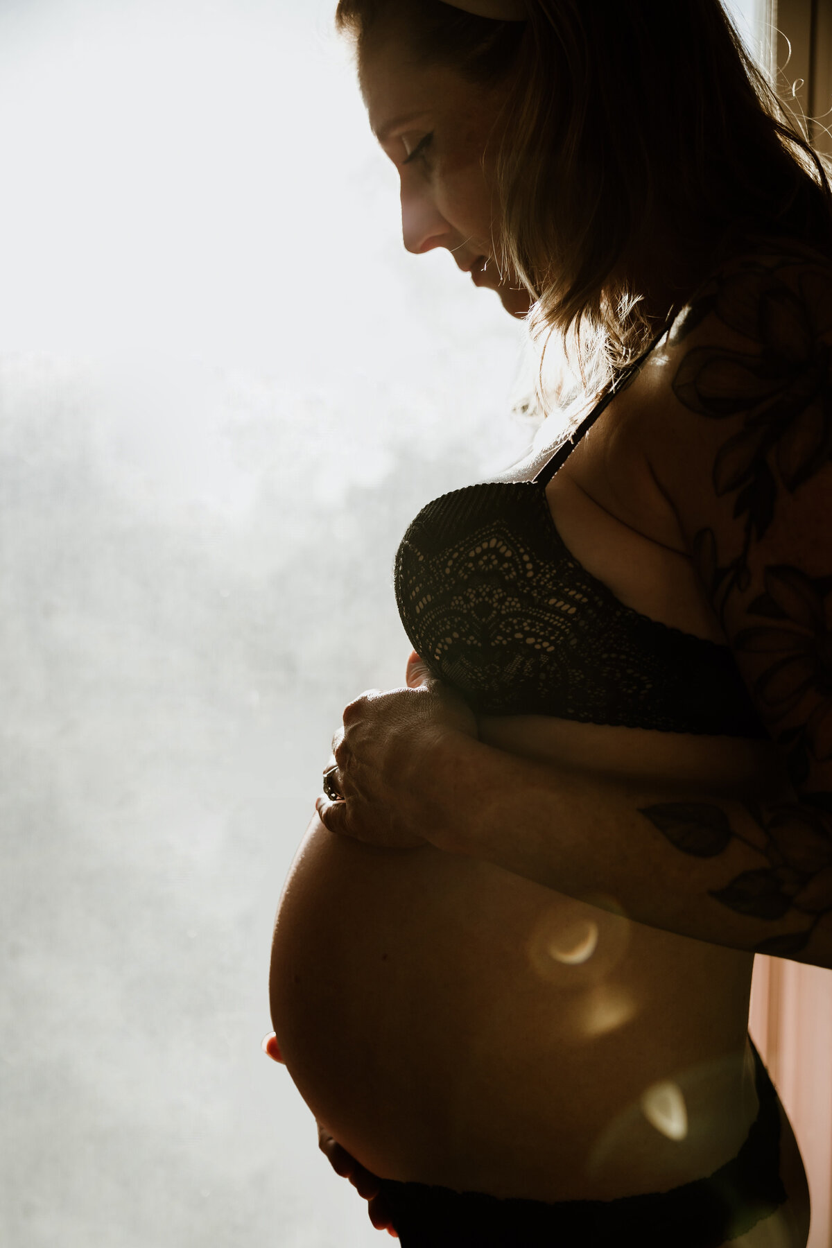 Silhouette of pregnant woman's body