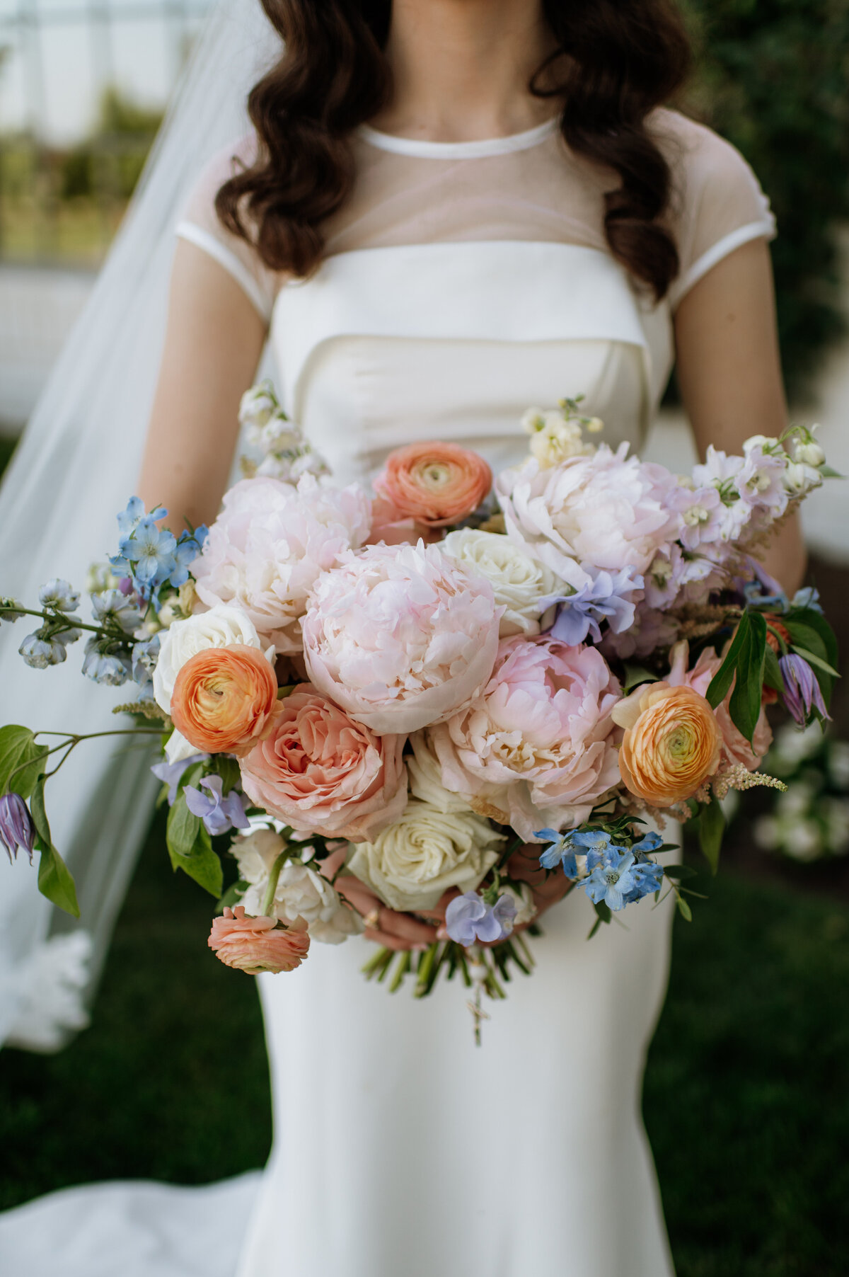 Bridal bouquet close-up with pastel flowers