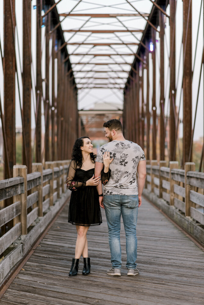 engagement portrait on a bridge