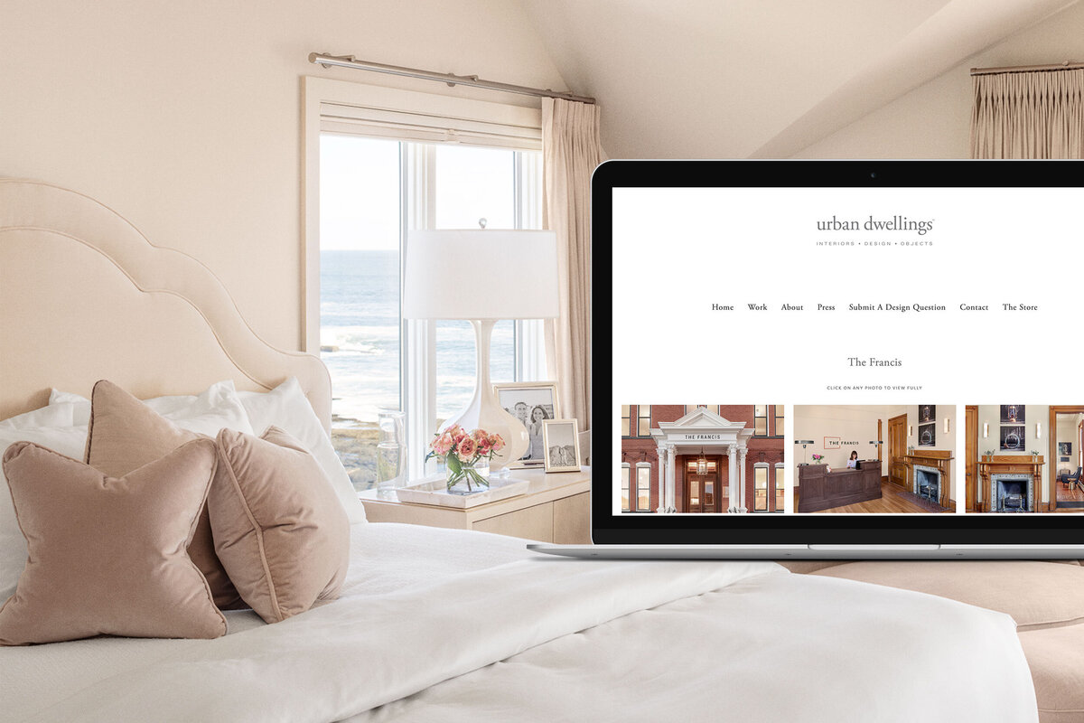 Mac Laptop mockup of L Studio PIlates website with background image of traditional bedroom interior