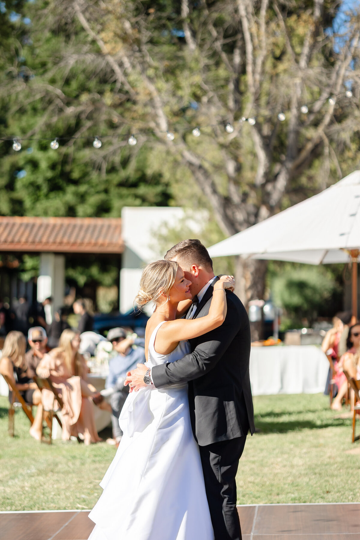 Couples hug on the aisle at saint mary church