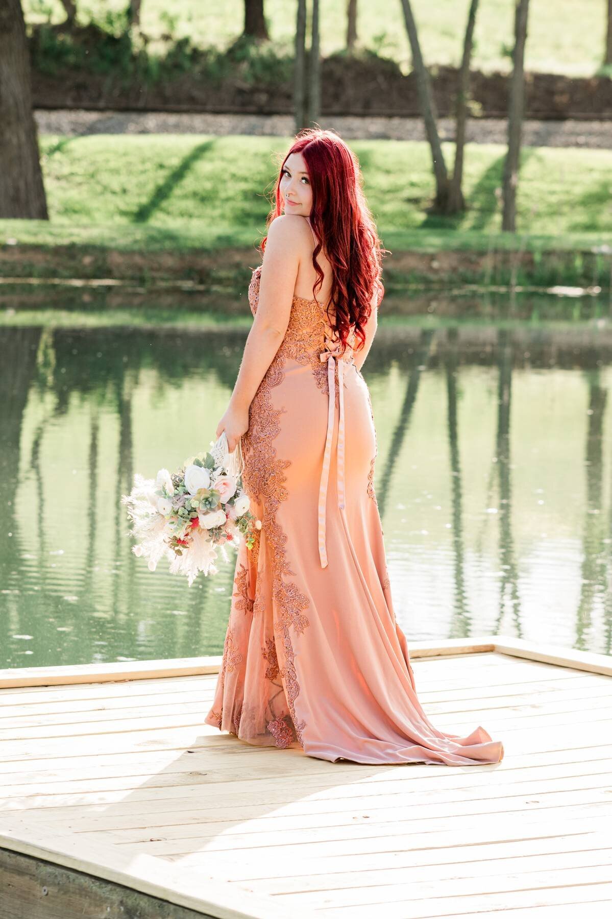 Girl in pink prom dress