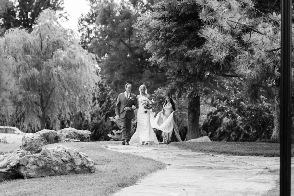 bride-and-father-walking-towards-aisle-together