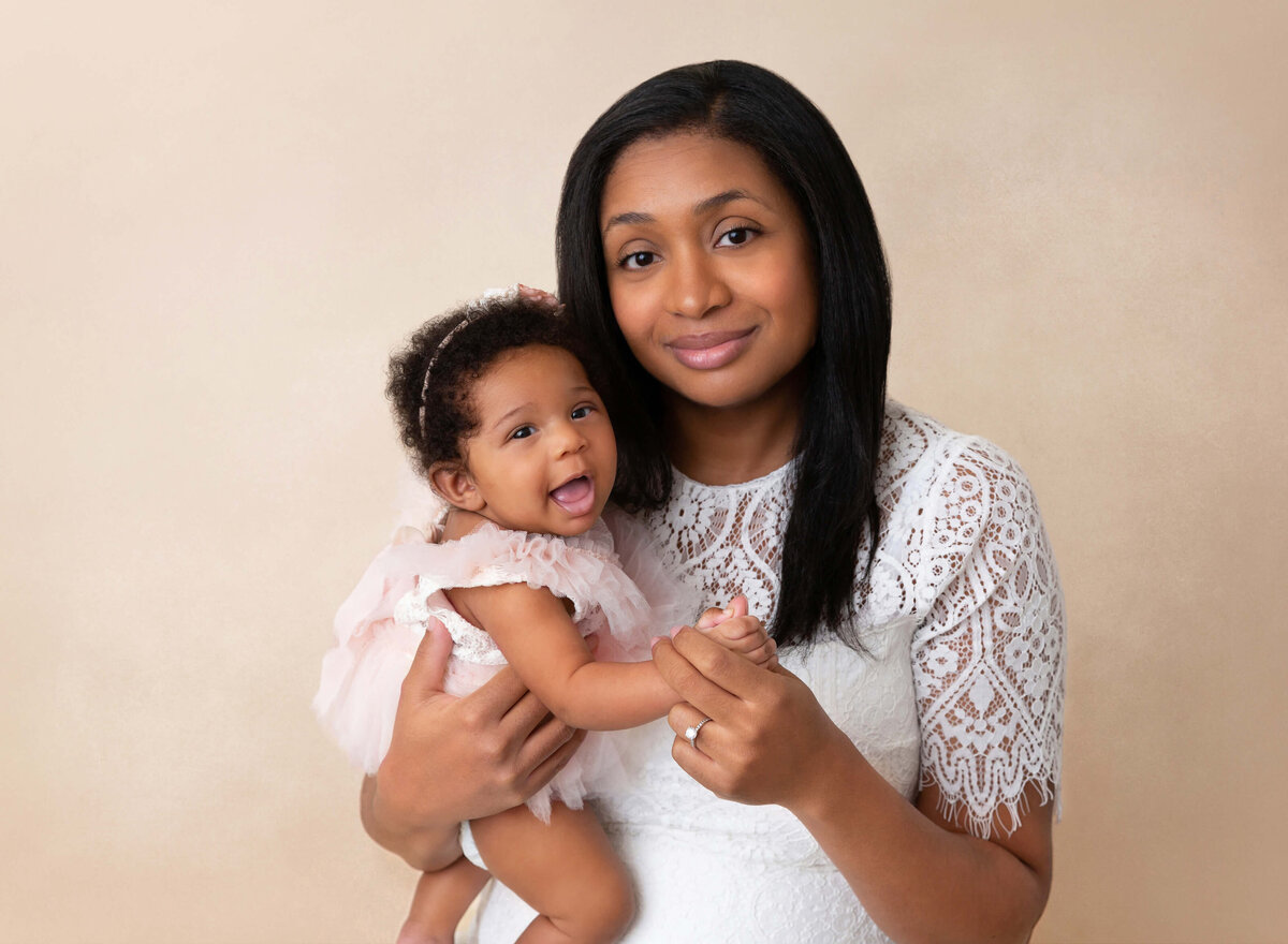 Mom and baby girl portraits done by Nyc baby photographer