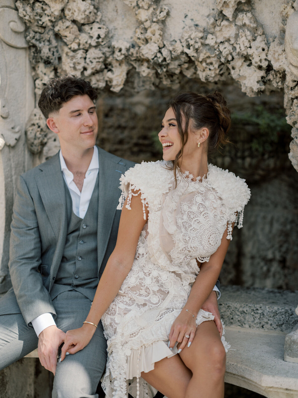 vizcaya-garden-engagment-couple-sitting