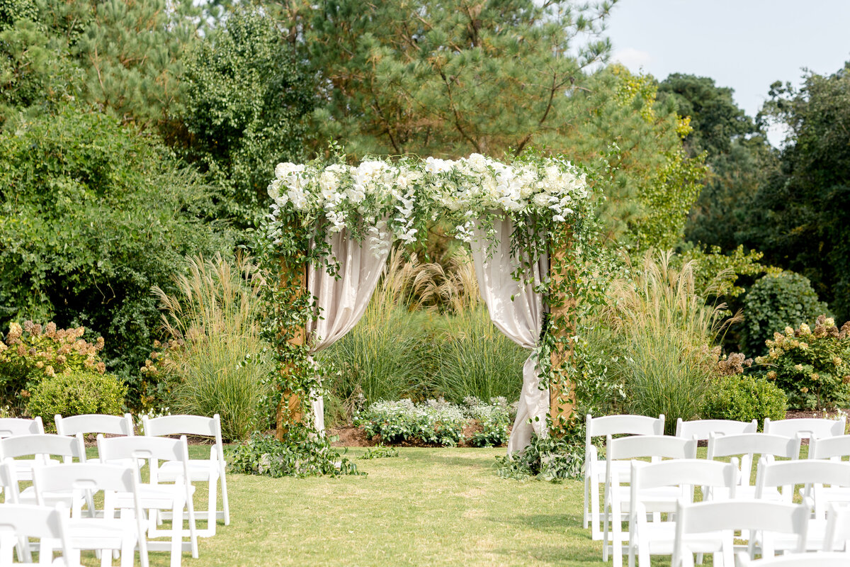 stunning ceremony arch with orchids