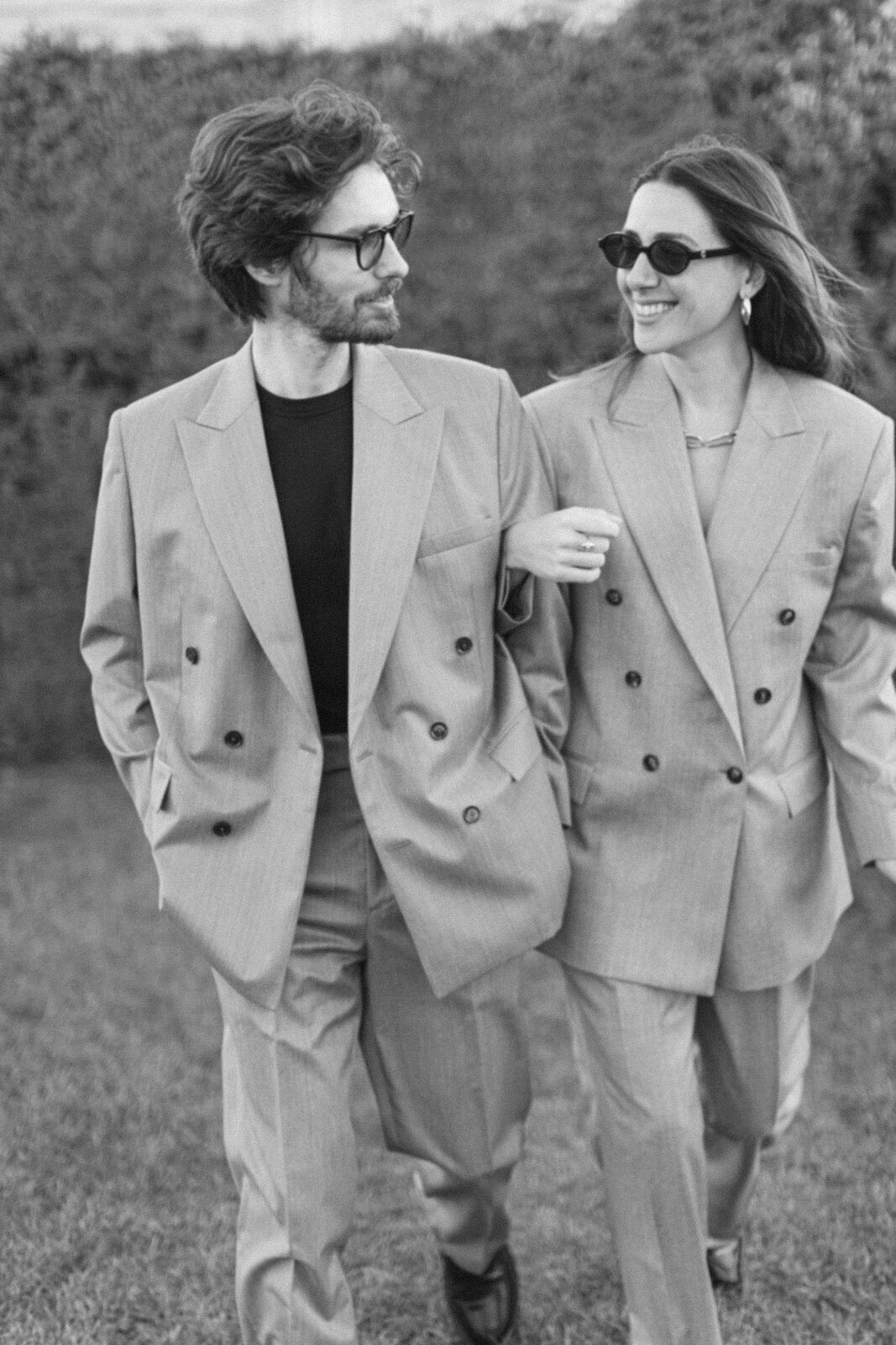 Engagement session at the Tuileries and Louvre in Paris, with a couple walking through the gardens under the morning light.