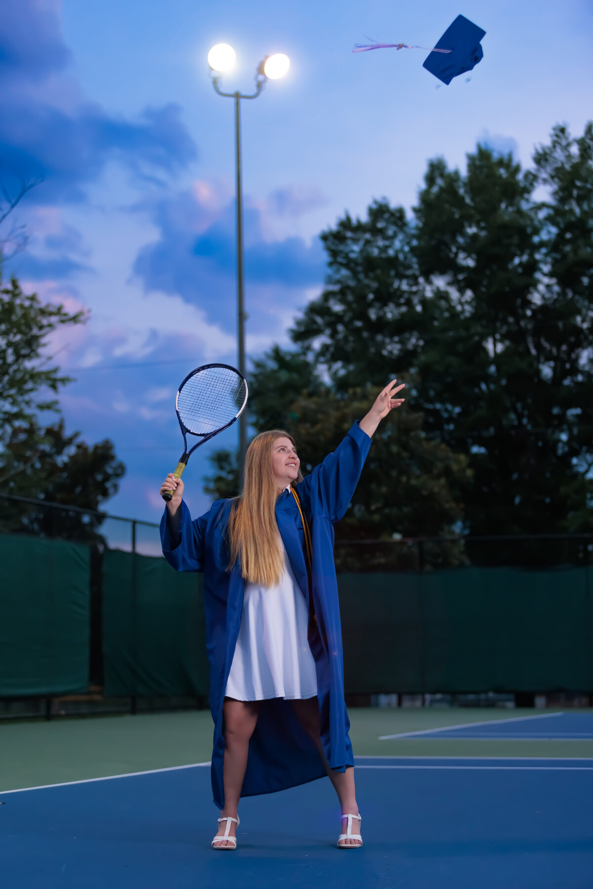 Cap and Gown Senior Portraits with tennis