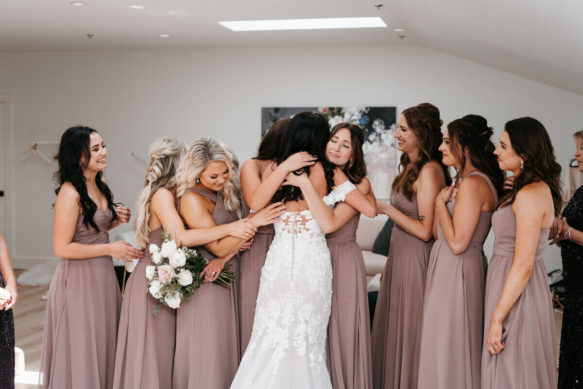 Bride with bridesmaids by best wedding planners in chicago