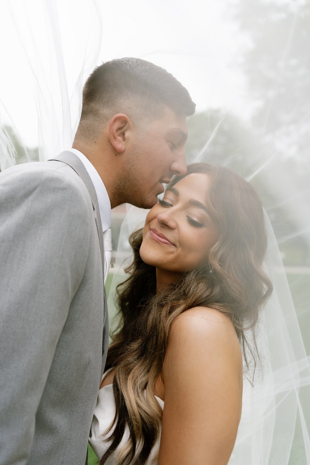 under-the-veil-bride-and-groom-photos