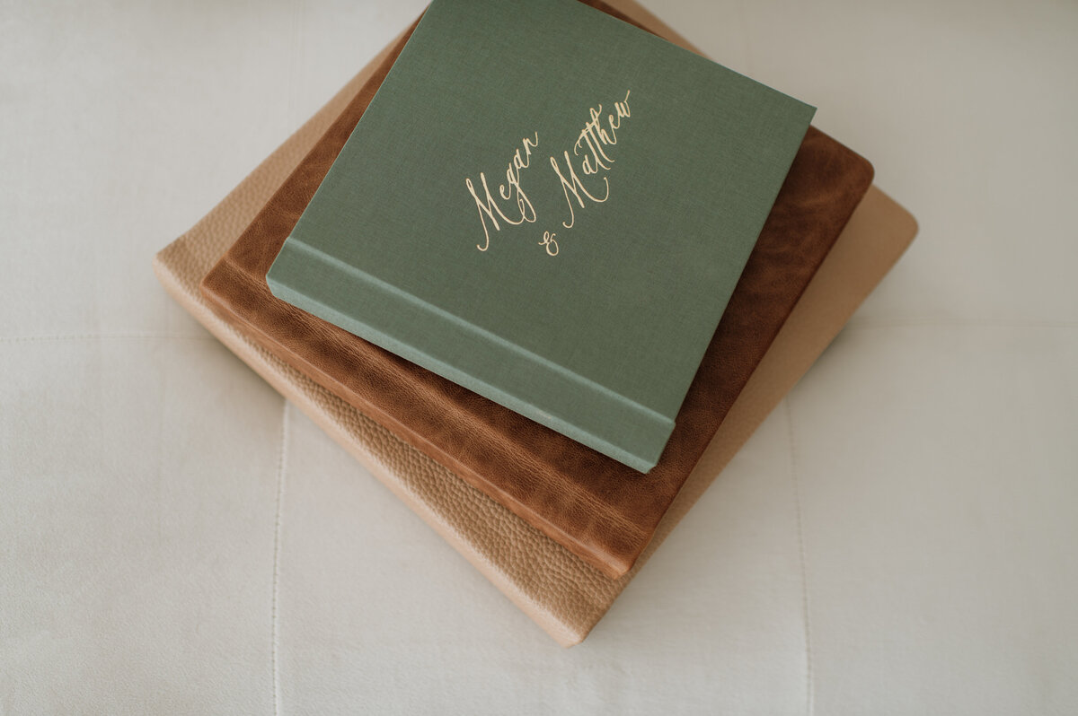 Open leather and fabric wedding albums