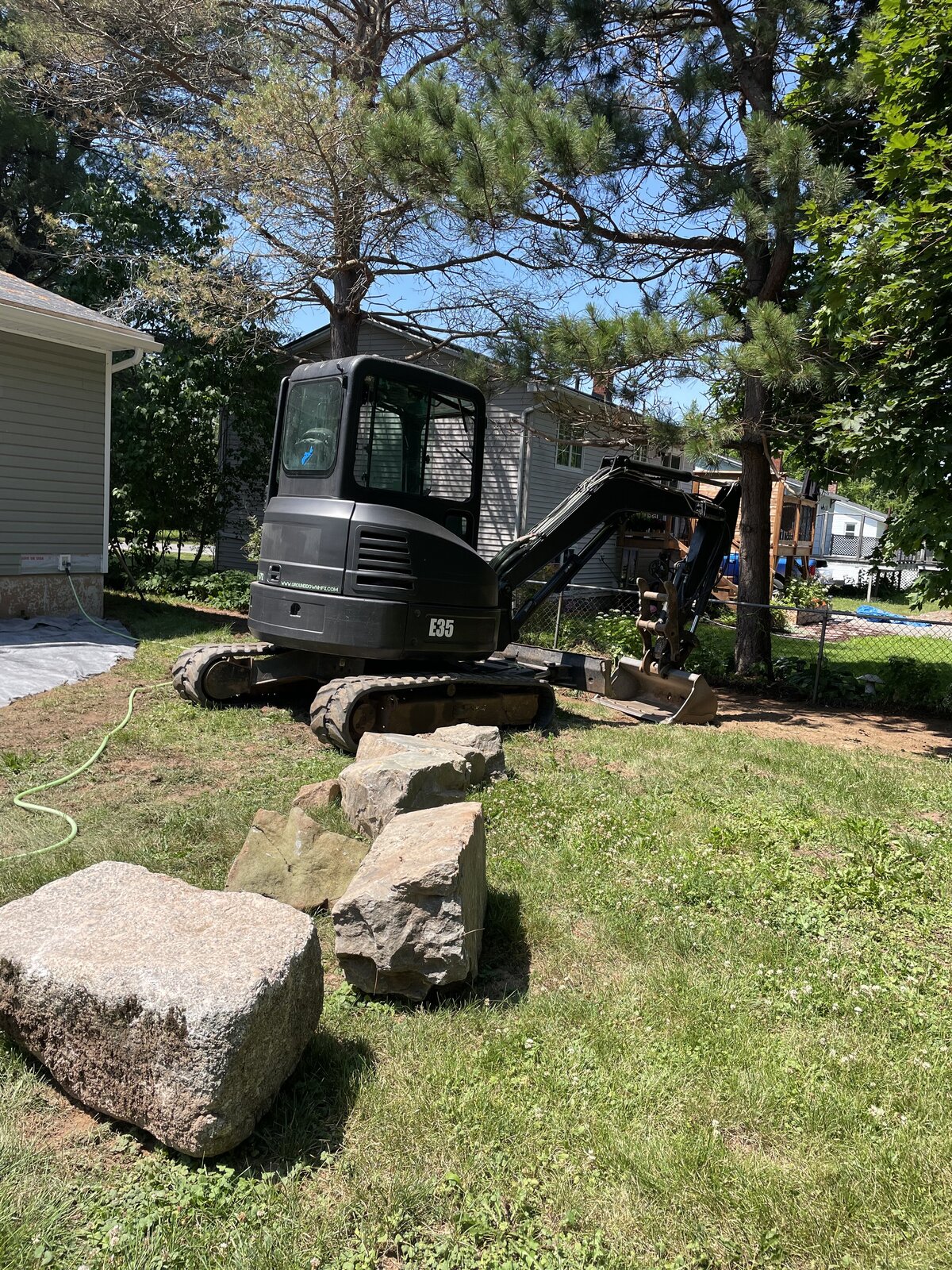 Ground Down Land Management - Halifax Excavation Services - Stone Landscaping for Swimming Pools and Patio Work