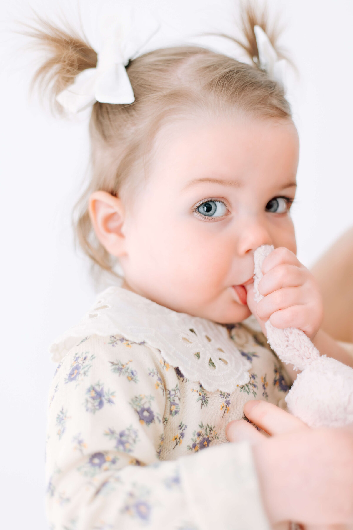 Adorable blonde baby girl with her teddy bear captured by Collingwood baby photographer Jennifer Walton.