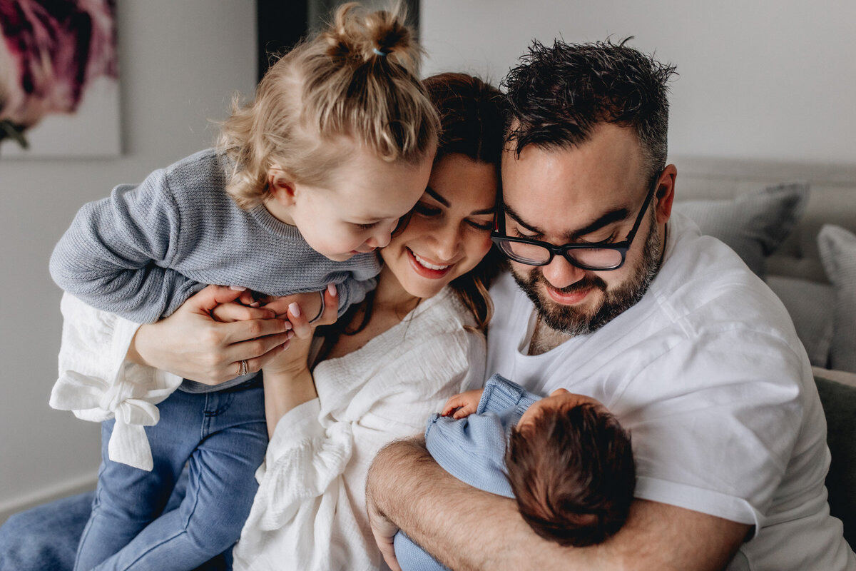 mum-dad-and-big-brother-looking-at-baby-In-Home-Newborn-Photography-Megan Browne-Melbourne-Newborn-Photographer (26)