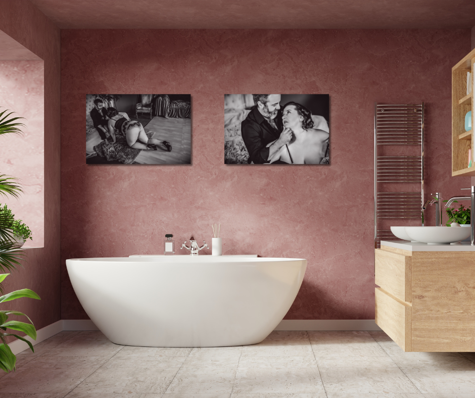 Pink bathroom with couples boudoir images on the wall above the bathtub in Minneapolis  Boudoir