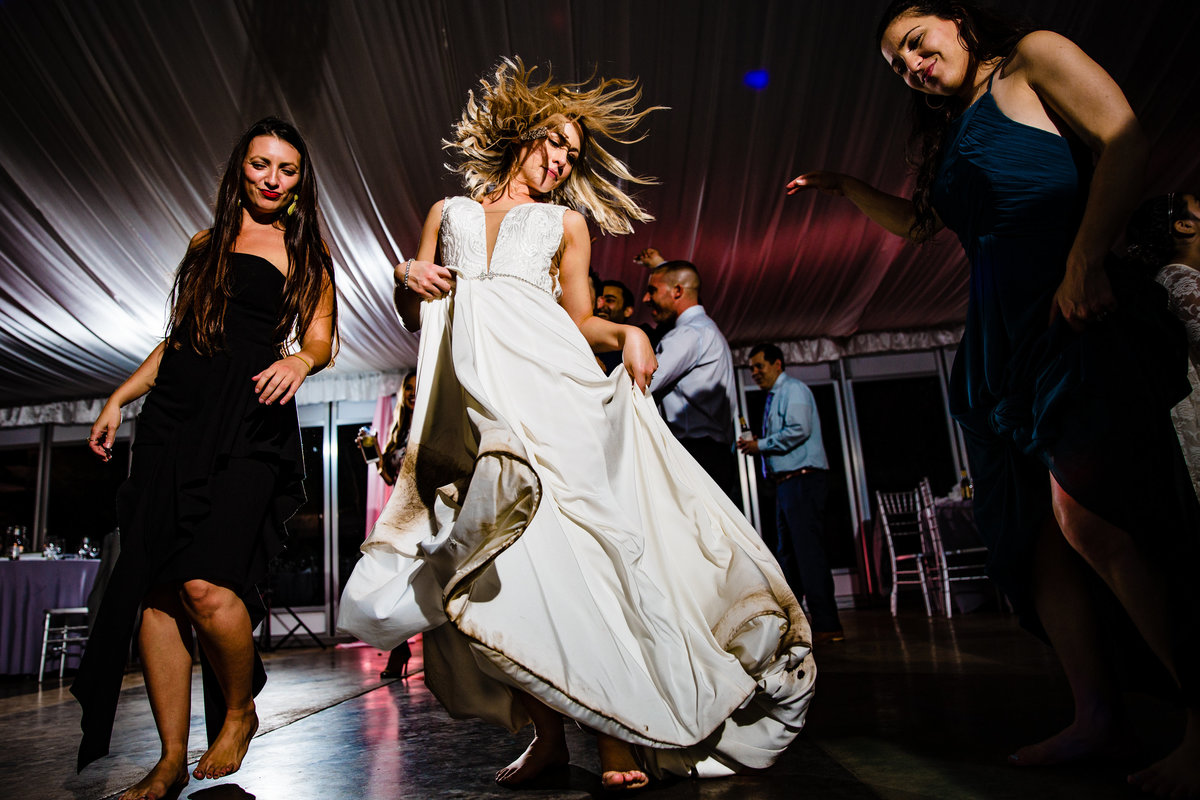Bride dances at reception at The Hummingbird House in Austin