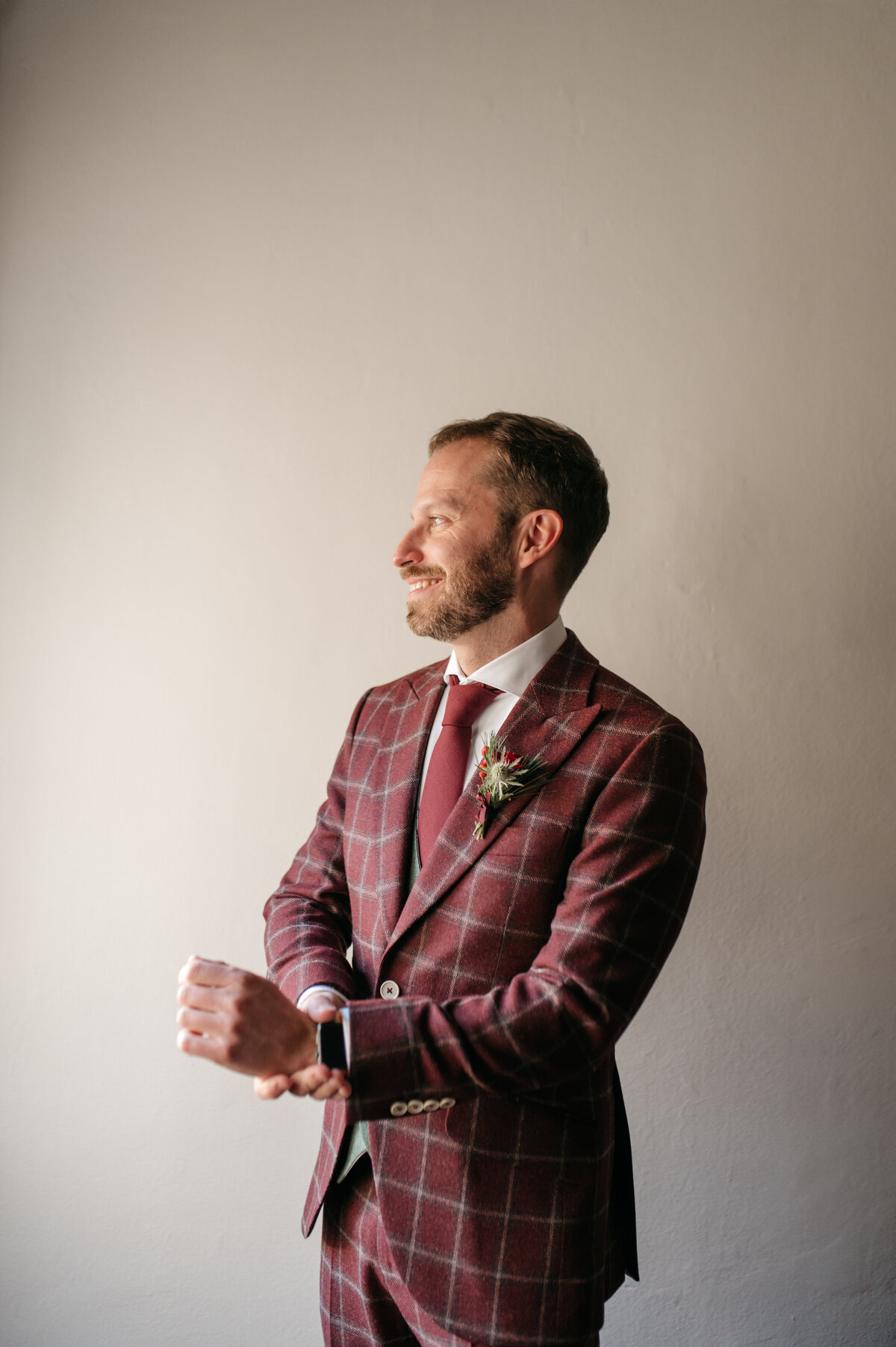 Groom in red