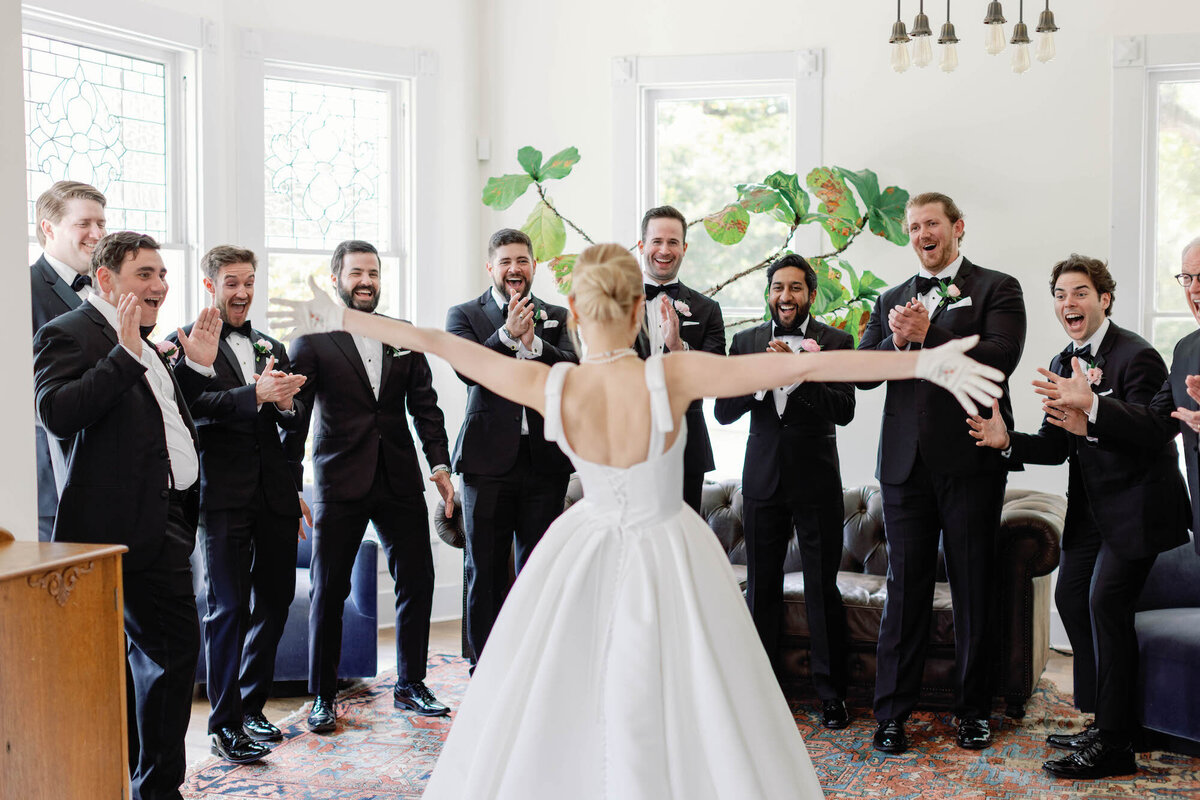groomsmen-bride-frst-look-at-the-grand-lady-2