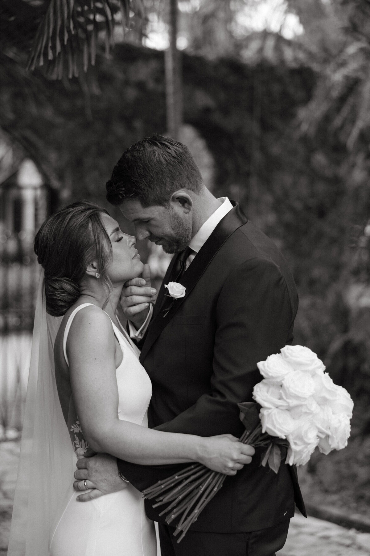 black-and-white-newlyweds-embrace-6GJ-W