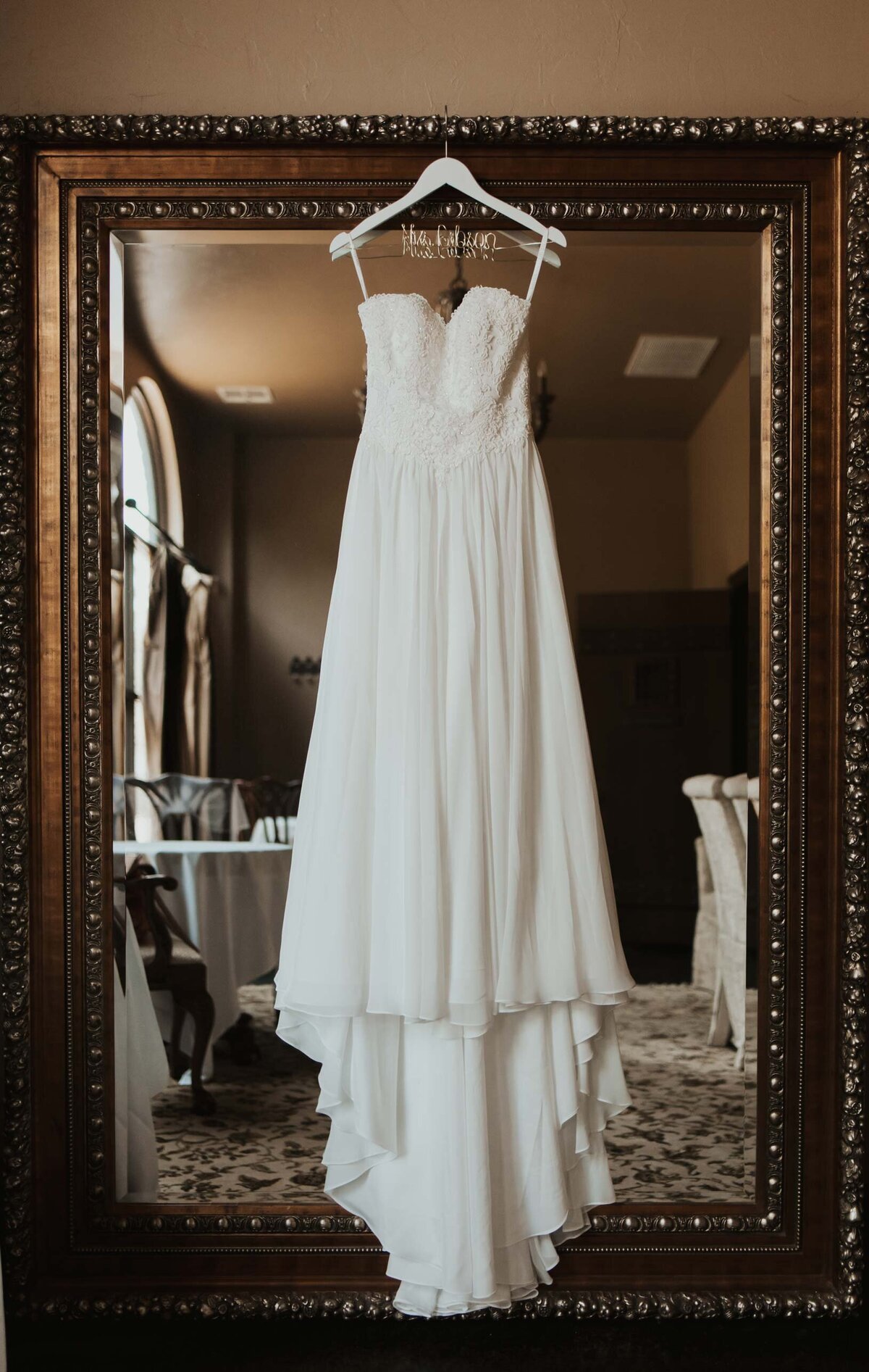 beaded-wedding-dress-on-hanger