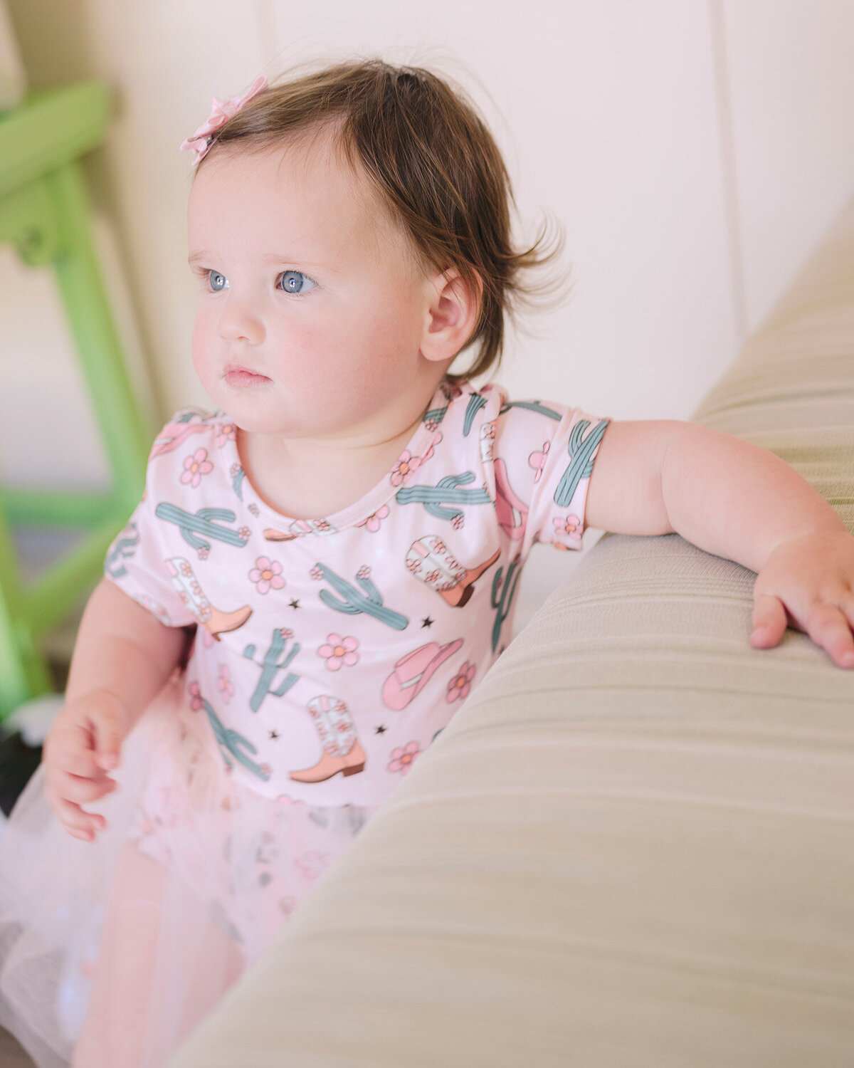 Close-up of baby girl’s face at her first birthday party in the San Francisco Bay Area, captured by a first birthday party photographer.

