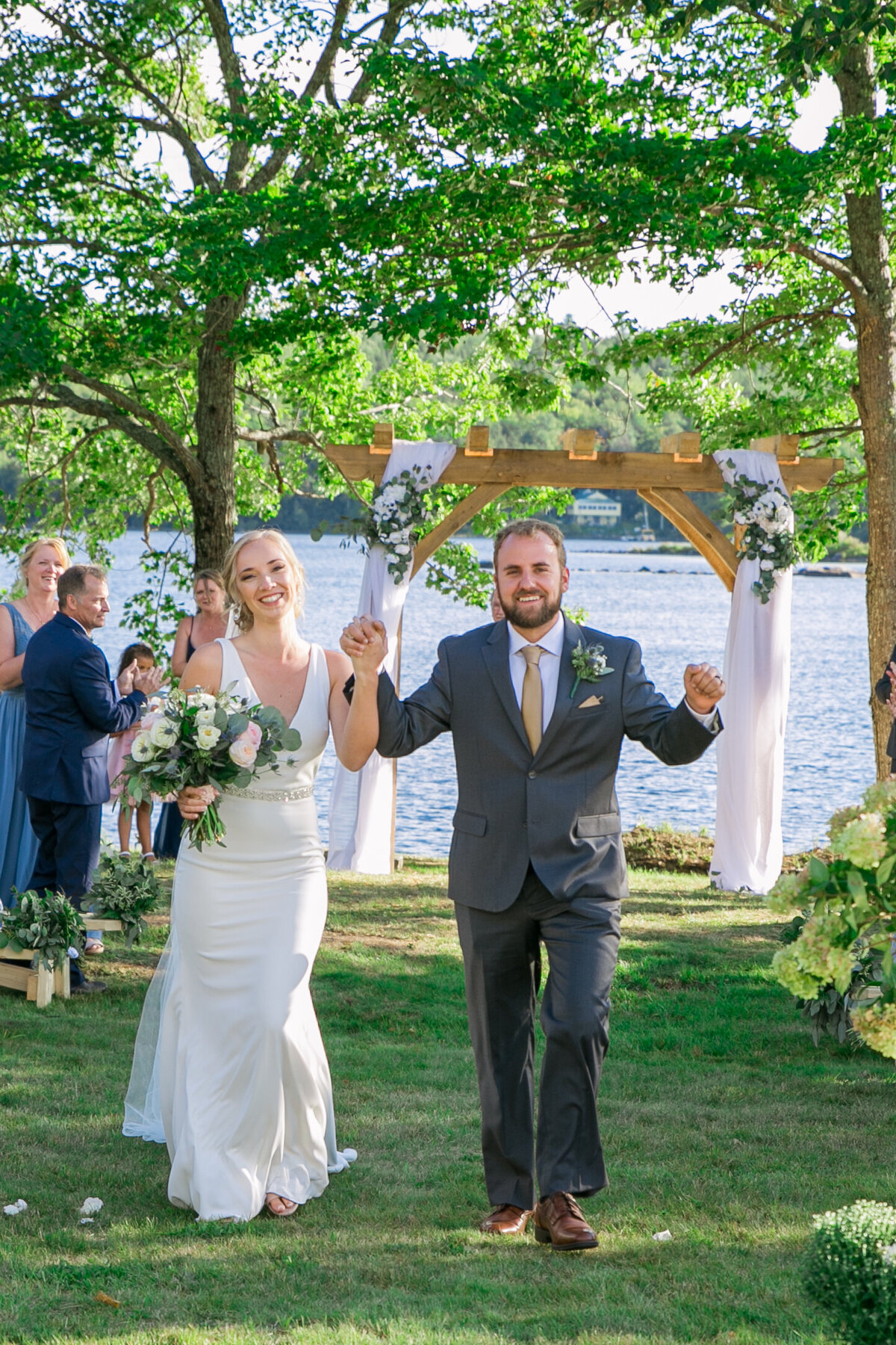Bride and Groom walking down the aisle | Grace on the Lake Wedding in Maine