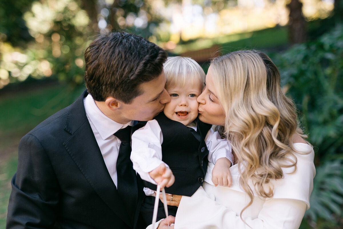 Bride and groom with their son after their Brisbane Registry Office wedding 