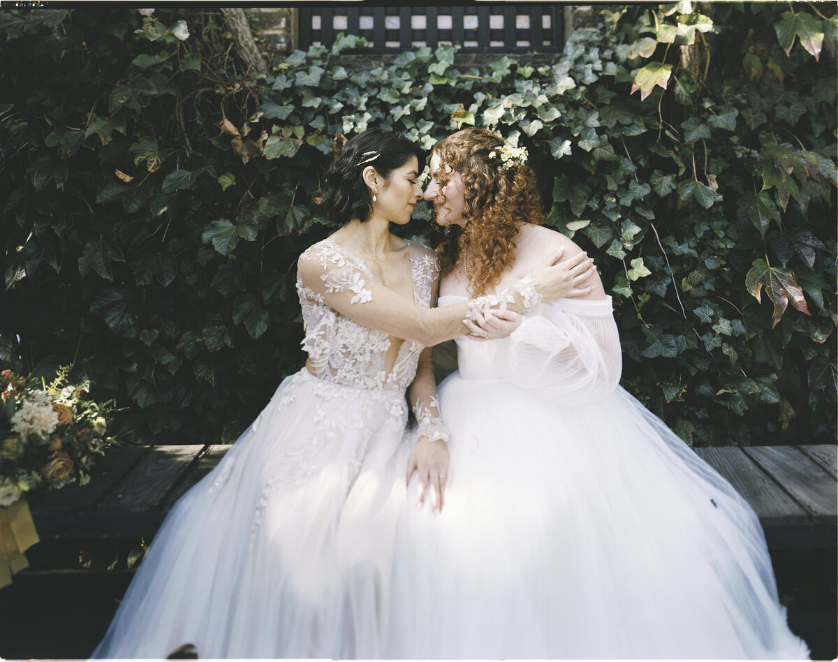 Large format LGBTQ wedding photography featuring emotional vows and candid reactions