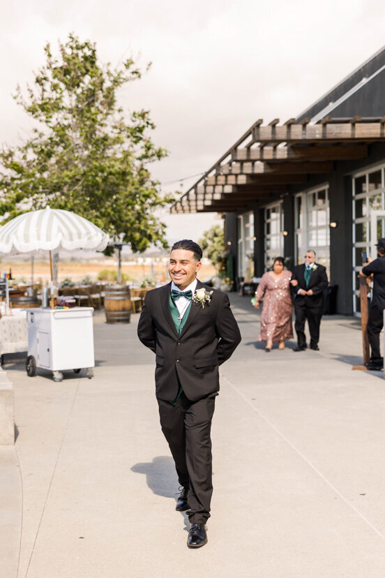 man-walking-down-aisle-salt-drift-point-venue