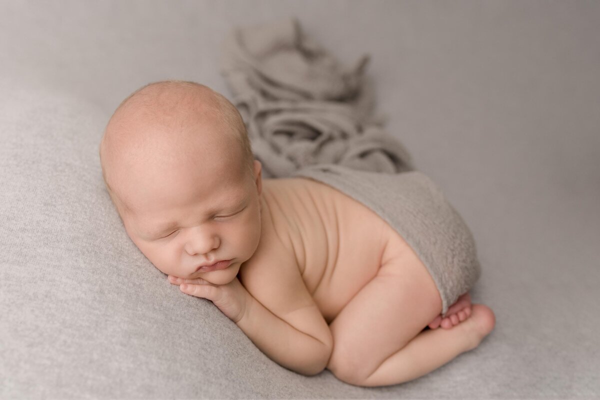 Newborn Baby Boy Sleeping On Tummy